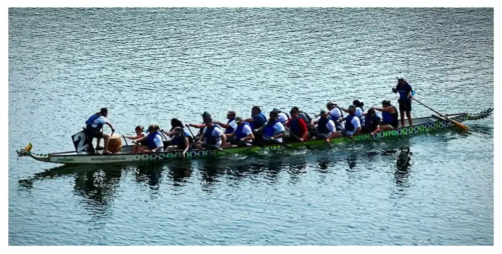 Dragon boat team “The Union Current” competing at Stonewall Lake.