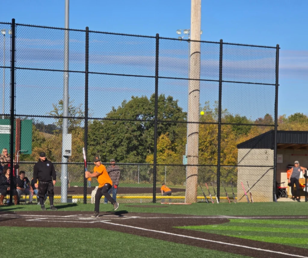 Laborers and Roofers union members playing in the Ohio Valley charity softball tournament.